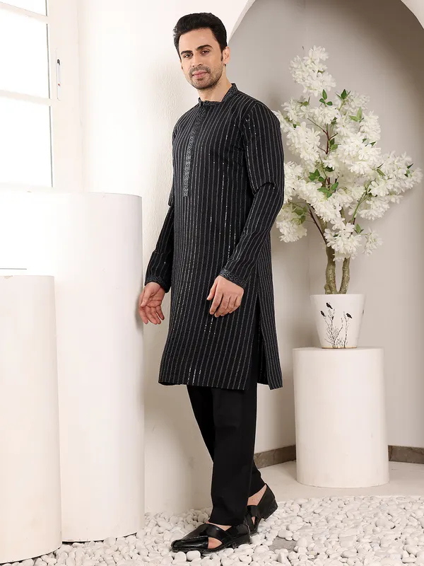Men's_Black_Straight_Viscose_Silk_Kurta_with_Embroidered_Neckline_and_Motifs,Cream_solid_trouser_style_churidar