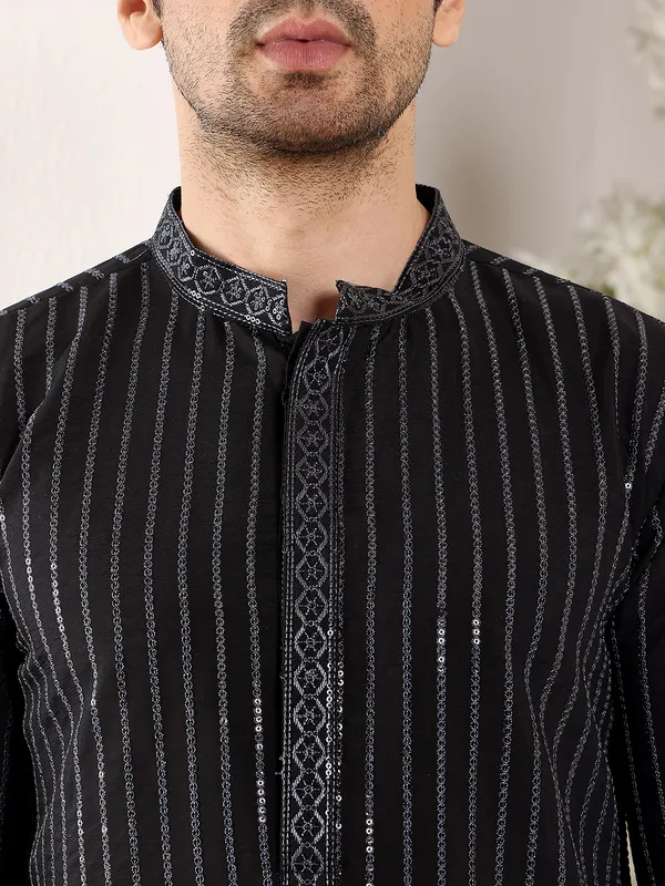 Men's_Black_Straight_Viscose_Silk_Kurta_with_Embroidered_Neckline_and_Motifs,Cream_solid_trouser_style_churidar