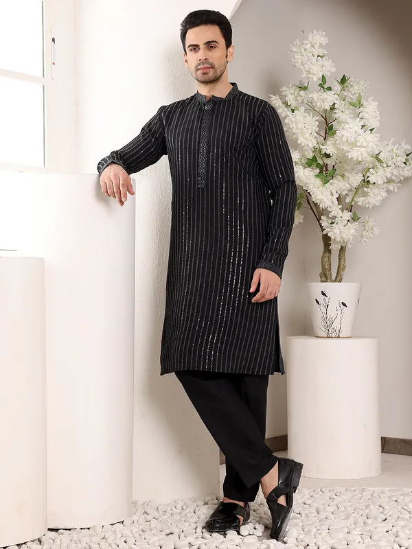 Men's_Black_Straight_Viscose_Silk_Kurta_with_Embroidered_Neckline_and_Motifs,Cream_solid_trouser_style_churidar