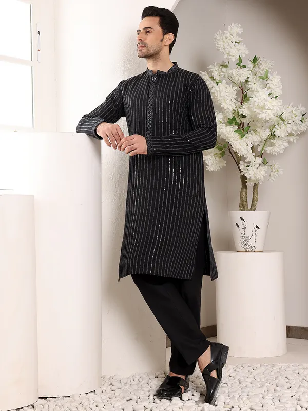 Men's_Black_Straight_Viscose_Silk_Kurta_with_Embroidered_Neckline_and_Motifs,Cream_solid_trouser_style_churidar