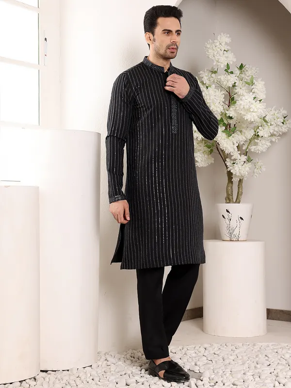 Men's_Black_Straight_Viscose_Silk_Kurta_with_Embroidered_Neckline_and_Motifs,Cream_solid_trouser_style_churidar