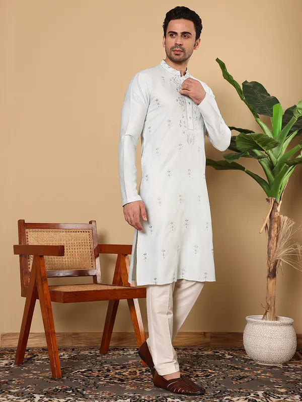 Men's_Light_Blue_Straight_Viscose_Silk_Kurta_with_Embroidered_Neckline_and_Motifs,Cream_solid_trouser_style_churidar