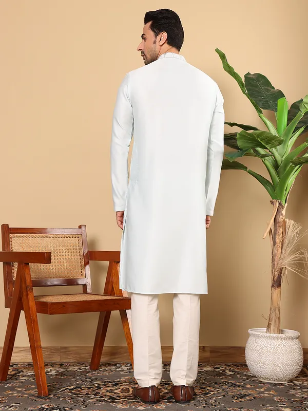 Men's_Light_Blue_Straight_Viscose_Silk_Kurta_with_Embroidered_Neckline_and_Motifs,Cream_solid_trouser_style_churidar