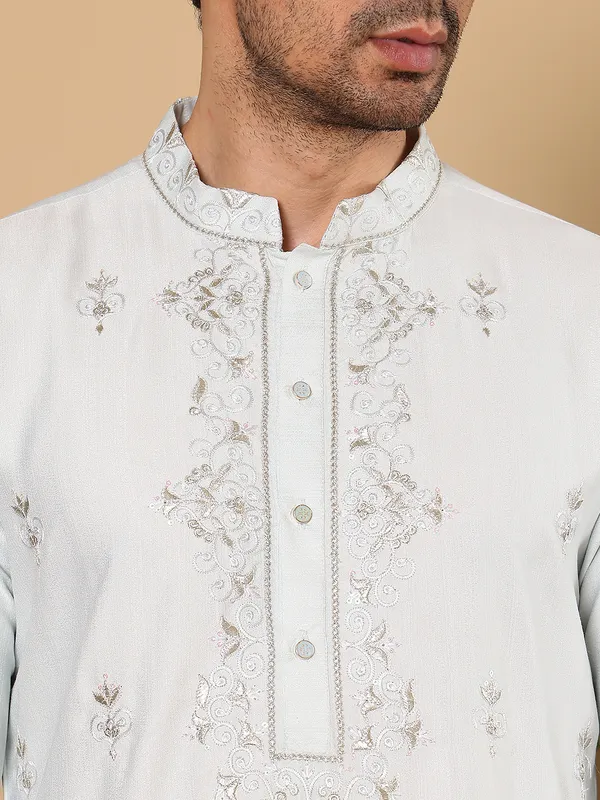 Men's_Light_Blue_Straight_Viscose_Silk_Kurta_with_Embroidered_Neckline_and_Motifs,Cream_solid_trouser_style_churidar