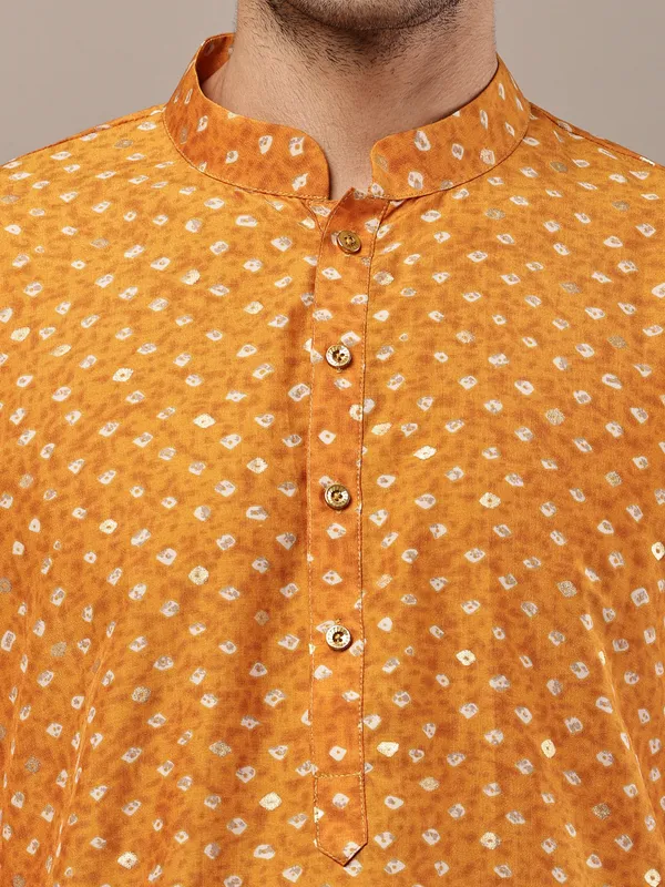 Mustard_Printed_Kurta_with_Cream_Pyjama_&_All-Over_Ethnic_Motifs_For_Men
