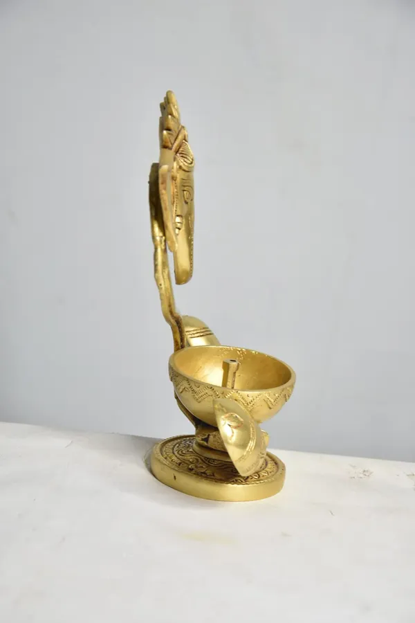 Handcrafted_Brass_Ganesh_Diya_(10_Inch,_1.5Kg,_Gold_Finish)_–_Premium_Deepak_For_Home_Decor