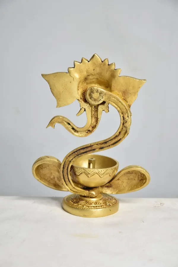 Handcrafted_Brass_Ganesh_Diya_(10_Inch,_1.5Kg,_Gold_Finish)_–_Premium_Deepak_For_Home_Decor
