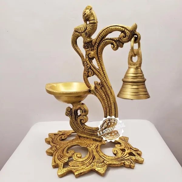 Brass_Hanging_Peacock_Diya_With_Bell_–_Antique_Finish_|_Deepak_For_Temple_&_Festive_Decor_By_Decor_By_Kk
