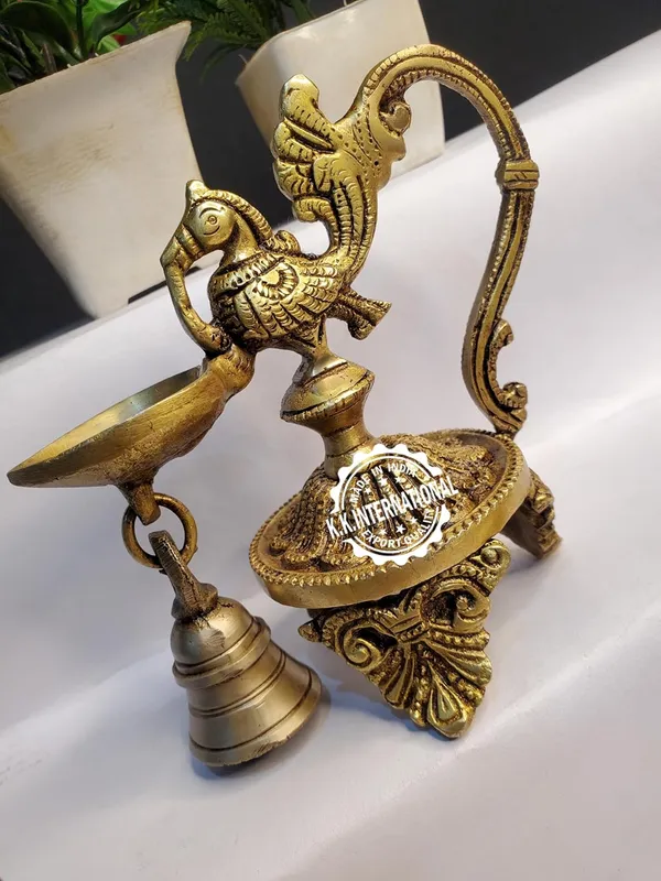 Brass_Peacock_Diya_With_Bell_Three_Leg_Base_(Set_Of_1)