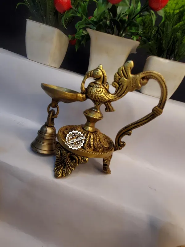 Brass_Peacock_Diya_With_Bell_Three_Leg_Base_(Set_Of_1)