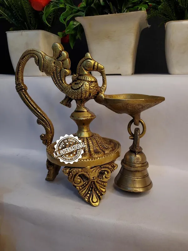 Brass_Peacock_Diya_With_Bell_Three_Leg_Base_(Set_Of_1)