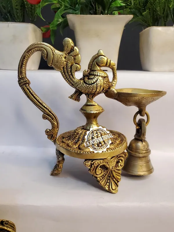 Brass_Peacock_Diya_With_Bell_Three_Leg_Base_(Set_Of_1)