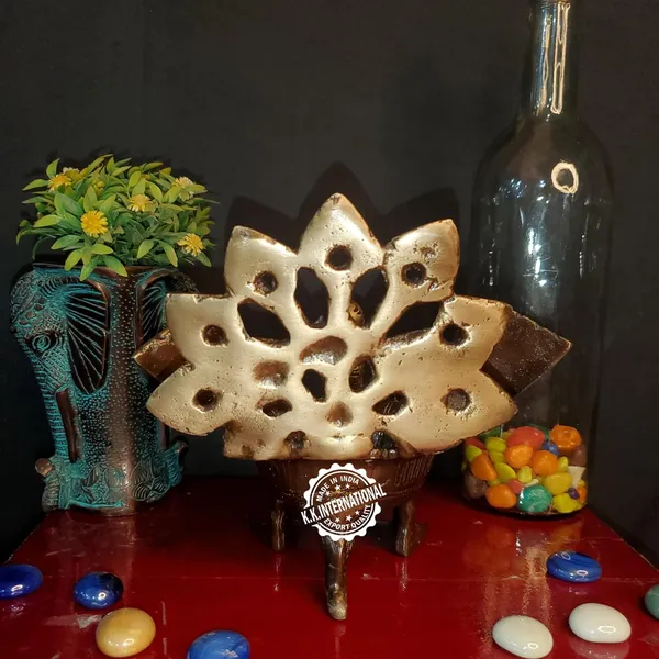 Handcrafted_Brass_Urli_With_Ethnic_Peacock_Design_–_Ideal_For_Home_Decoration