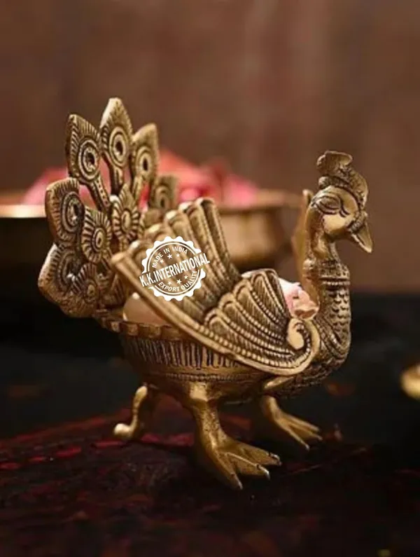 Handcrafted_Brass_Urli_With_Ethnic_Peacock_Design_–_Ideal_For_Home_Decoration