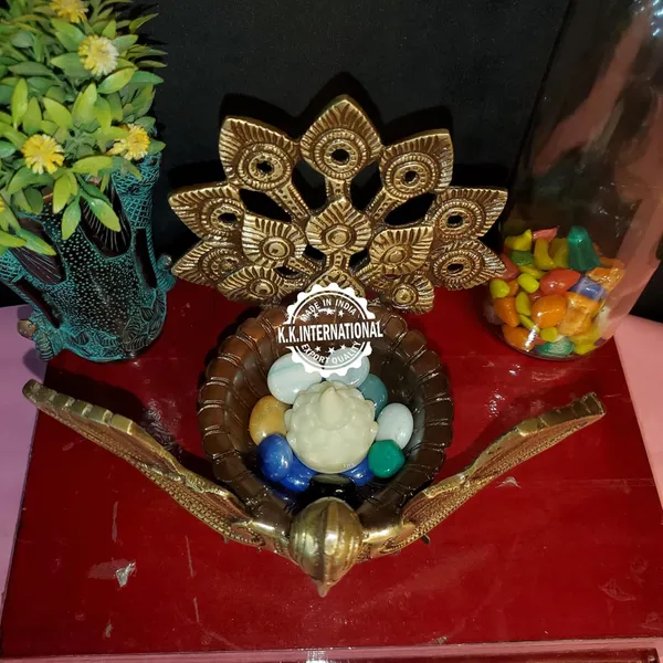 Handcrafted_Brass_Urli_With_Ethnic_Peacock_Design_–_Ideal_For_Home_Decoration