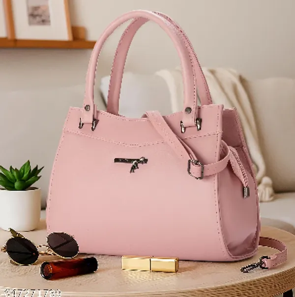 Elegant_Pink_Structured_Handbag_with_Sling_Strap