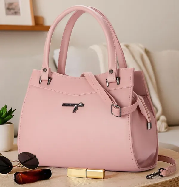 Elegant_Pink_Structured_Handbag_with_Sling_Strap