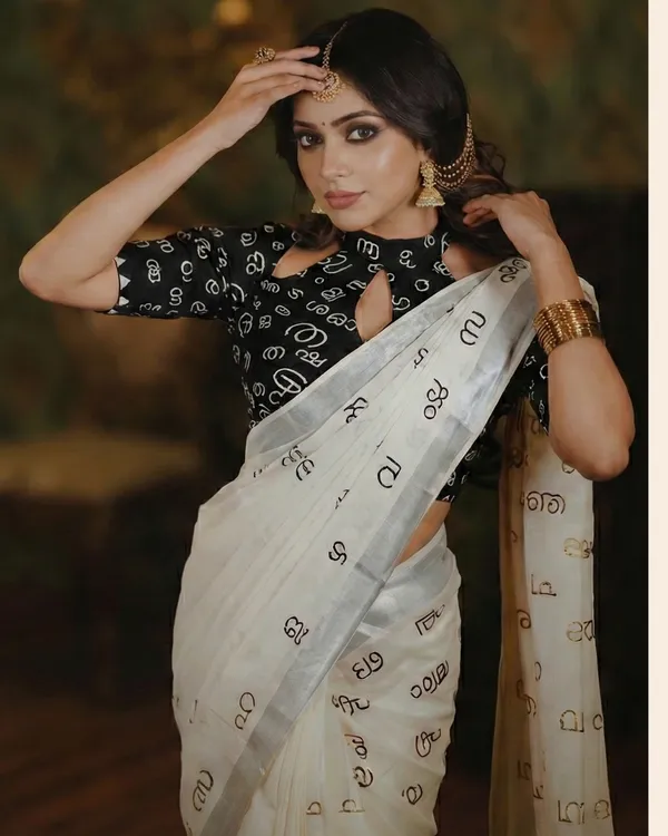 Off_White_And_Ivory_With_Silver_Border_&_Black_Script_Motifs_Akshara_Kasavu_Silver_Script_Motif_Kerala_Saree