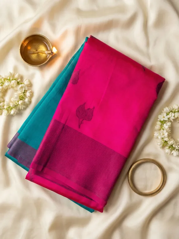 Teal_Green_&_Rani_Pink_Firoza_Pattu_With_Lotus_Butta_Border_Saree