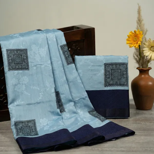 Sky_Blue_And_Navy_Blue_Neelam_Aura_Semi_Silk_Woven_Saree
