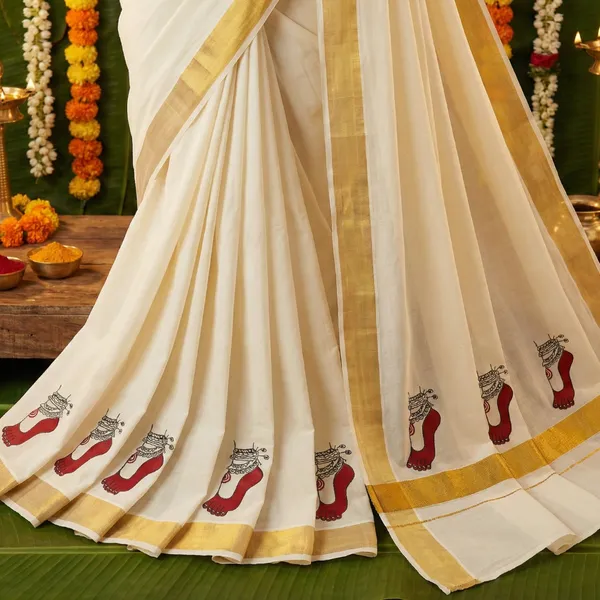 Off_White_Ivory_With_Gold_Border_And_Red_Motif_Lakshmi_Paadam_Kasavu_Kerala_Saree_With_Golden_Border
