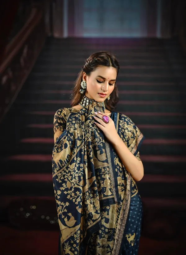 Navy_Blue_Stunning_Saree_With_Rich_Gold_Animal_&_Tree_Motifs,_Featuring_An_Intricate_Designer_Border,_Perfect_For_Traditional_&_Festive_Occasions