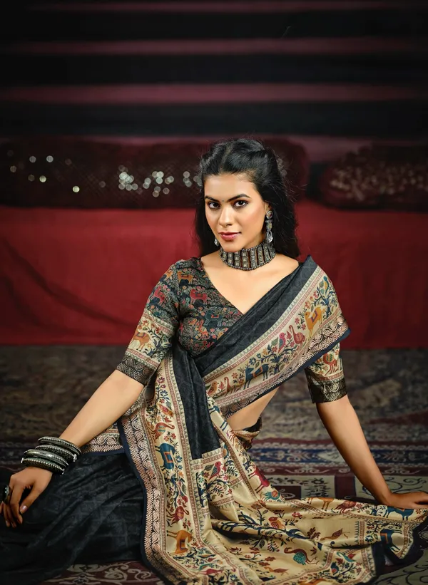 Black_Elegant_Saree_With_Artistic_Animal_&_Tree_Motifs,_Featuring_A_Beautifully_Detailed_Border_&_Pallu,_Perfect_For_Festive_&_Ethnic_Occasions.