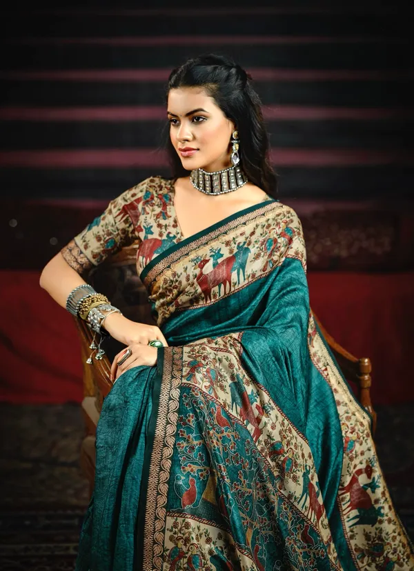 Teal_Blue_Vibrant_Saree_Featuring_Traditional_Animal_&_Floral_Motifs_With_A_Richly_Detailed_Pallu_&_Border,_Perfect_For_Festive_&_Elegant_Occasions