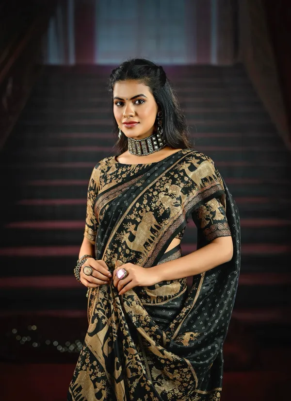Stunning_Black_Saree_With_Rich_Gold_Animal_&_Tree_Motifs,_Featuring_An_Ornate_Border,_Perfect_For_Festive_&_Traditional_Occasions