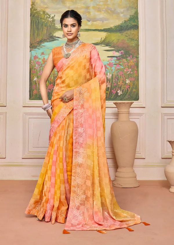 Orange_&_Pink_Elegant_Pastel_Brasso_Saree_With_A_Checkered_Design_&_Delicate_Embroidery_With_Heavy_Sequence_Blouse_Perfect_For_Festive_&_Special_Occasions