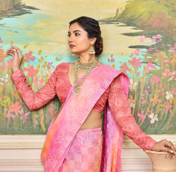 Pink_&_Peach_Charming_Brasso_Saree_With_A_Checkered_Design_&_Delicate_Embroidery_With_Heavy_Sequence_Blouse_Perfect_For_Festive_&_Special_Occasions