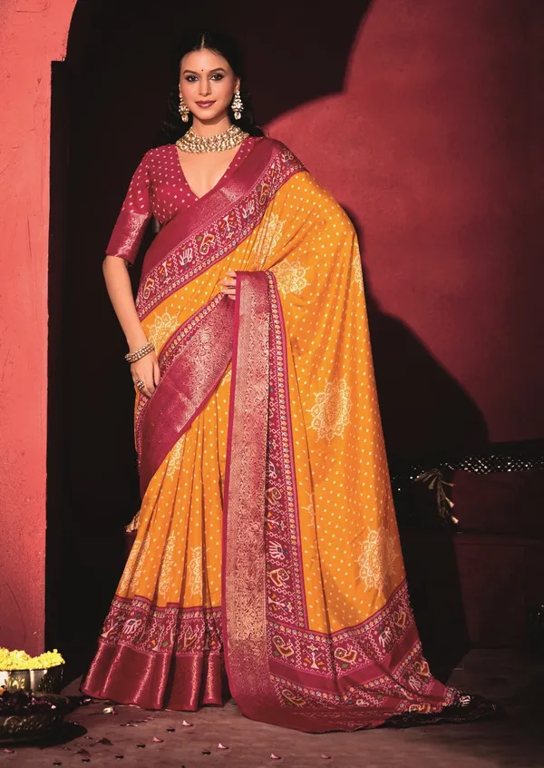 Yellow_&_Red_Pure_Silk_Fabric_With_Turmeric_Dual_Color_Combination_Of_Exclusive_Bandhej_Print_With_Rich_Look_Jacquard_Border_Exclusive_Look_Saree