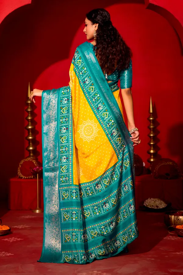 Lemon_Yellow_&_Turquoise_Blue_Pure_Silk_Fabric_With_Dual_Color_Combination_Of_Exclusive_Bandhej_Print_With_Rich_Look_Jacquard_Border_Exclusive_Look_Saree