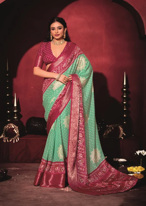 Light_Sea_Green_&_Magenta_Pure_Silk_Fabric_With_Exclusive_Dual_Color_Combination_Of_Exclusive_Bandhej_Print_With_Rich_Look_Jacquard_Border_Exclusive_Look_Saree