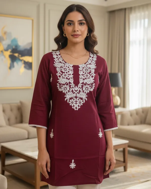 Elegantly_crafted_rayon_chikankari_short_kurti_featuring_intricate_white_embroidery
