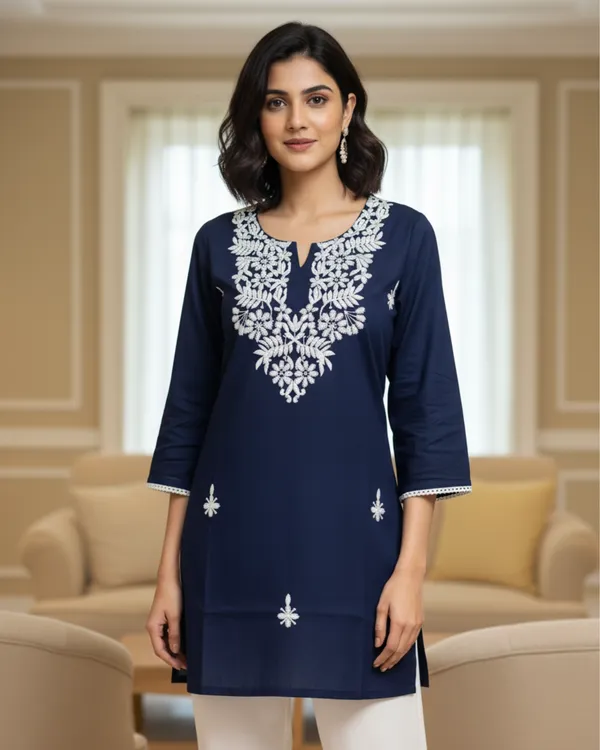 Elegantly_crafted_rayon_chikankari_short_kurti_featuring_intricate_white_embroidery