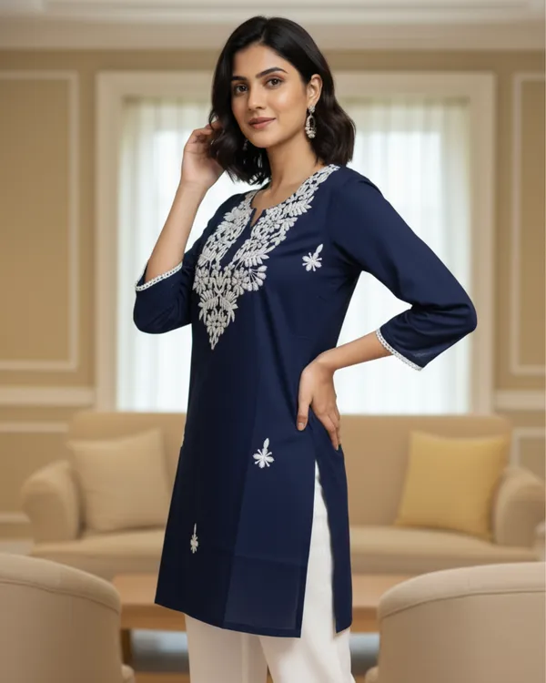 Elegantly_crafted_rayon_chikankari_short_kurti_featuring_intricate_white_embroidery