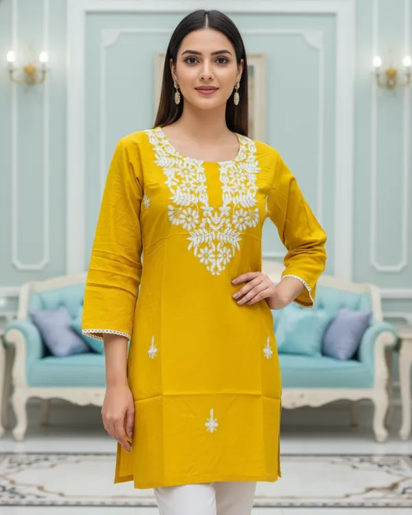 Elegantly_crafted_rayon_chikankari_short_kurti_featuring_intricate_white_embroidery