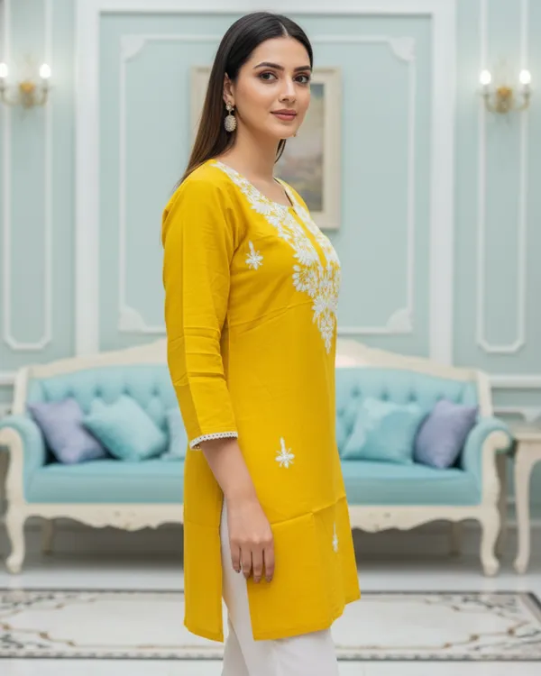 Elegantly_crafted_rayon_chikankari_short_kurti_featuring_intricate_white_embroidery