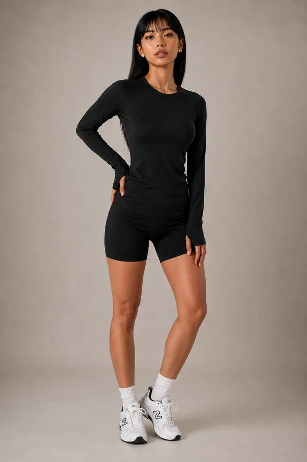 Black_Semi-Premium_Nylon_Women’s_Long_Sleeve_Workout_Top_with_Thumb_Holes