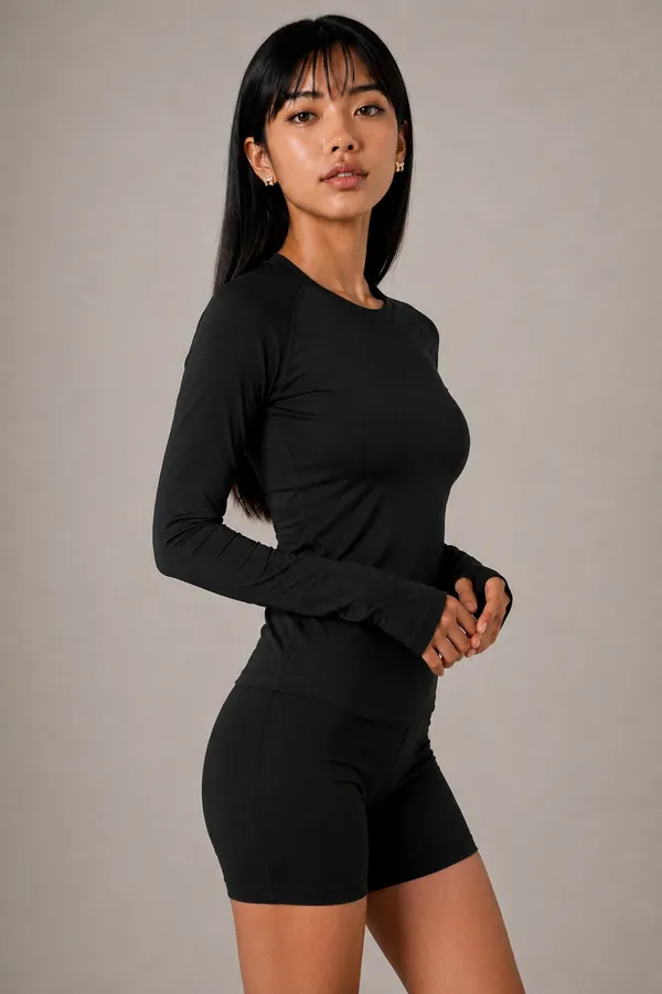 Black_Semi-Premium_Nylon_Women’s_Long_Sleeve_Workout_Top_with_Thumb_Holes
