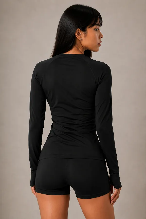 Black_Semi-Premium_Nylon_Women’s_Long_Sleeve_Workout_Top_with_Thumb_Holes