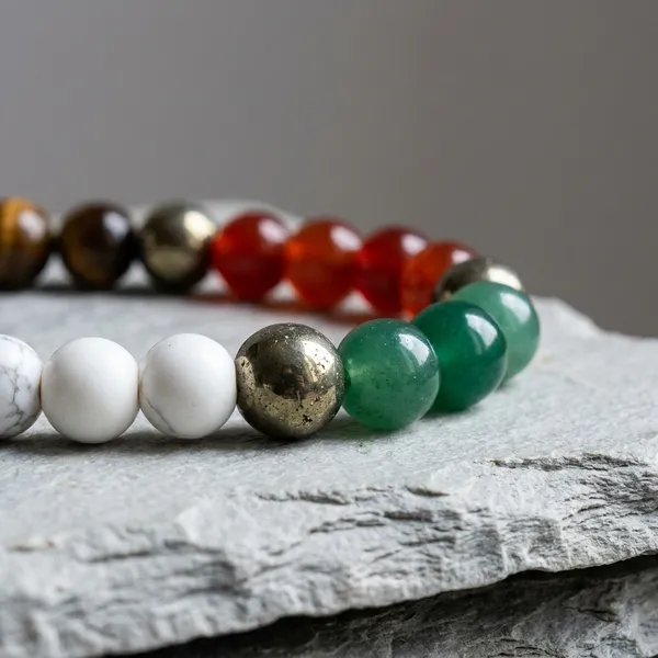 STUDY_BRACELETWITH_POWER_OF_NATURAL_PYRITE_,JADE,TIGEREYE_BEADS