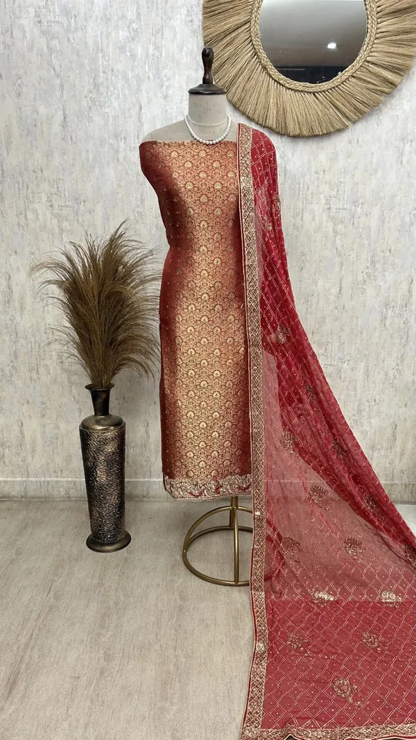 Festive_Elegance_Unstiched_Suit_Rust_Orange_With_Golden_Embroidery