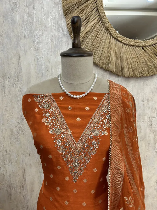 Dola_Silk_Unstitched_Suit_With_V_Neckline_Orange