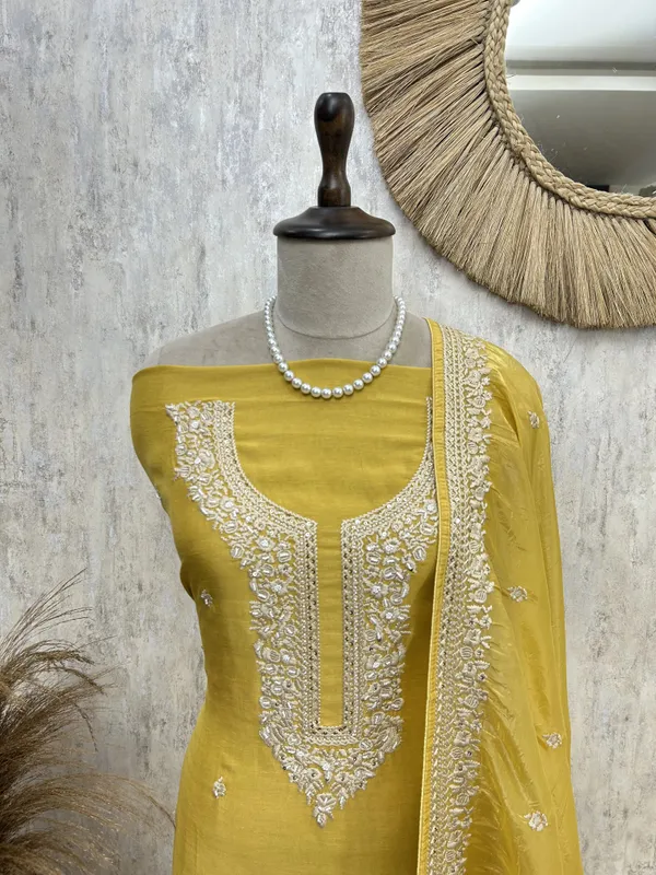 Linen_Unstitched_Suit_With_Intricate_Hand_Embroidery_Mustard_Yellow
