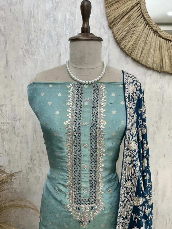 Tissue_Silk_Unstitched_Suit_Set_With_Parsi_Dupatta_Dark_Turqoise