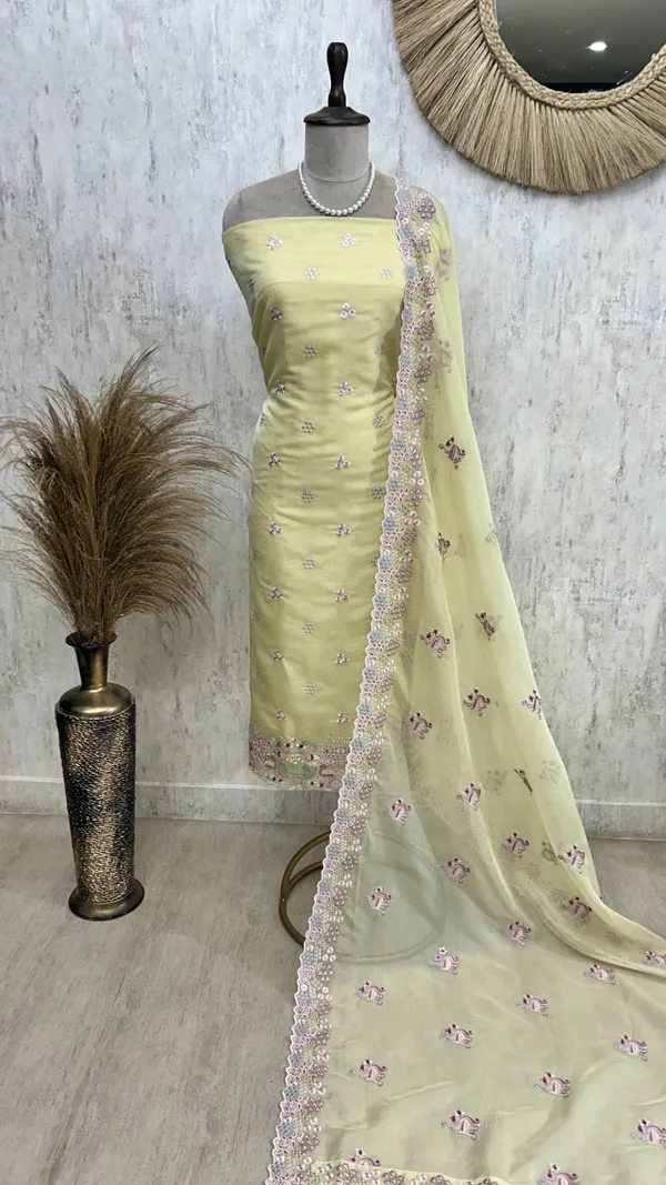 Organza_Unstitched_Suit_Set_With_Thread_Work_Flamingo_Motif_Light_Yellow