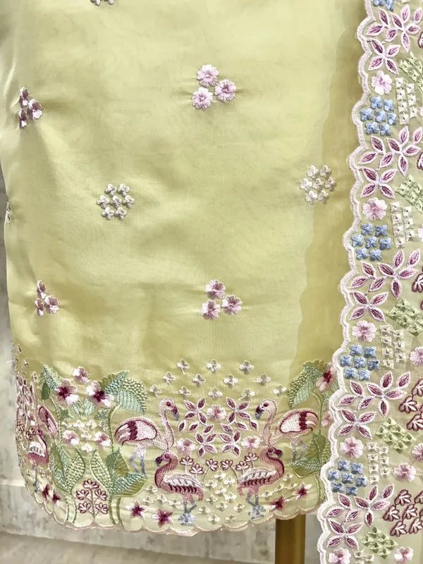 Organza_Unstitched_Suit_Set_With_Thread_Work_Flamingo_Motif_Light_Yellow