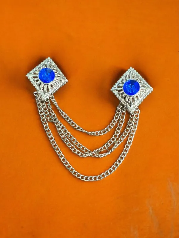 Voxon_Crowned_Deep_Red_Stone_with_Abstract_Work_and_Hanging_4_Chain_Brooch_(Blue)